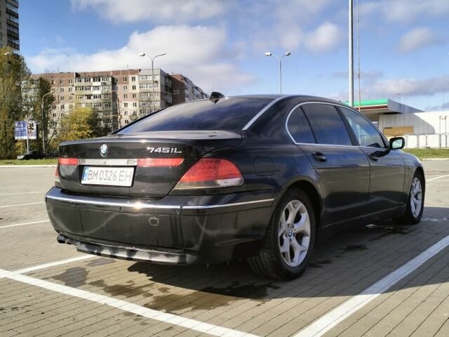 Черный БМВ 7 Серия, объемом двигателя 4.4 л и пробегом 240 тыс. км за 7000 $, фото 3 на Automoto.ua