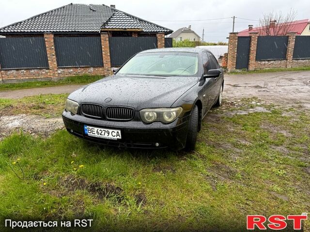 Чорний БМВ 7 Серія, об'ємом двигуна 3 л та пробігом 280 тис. км за 6500 $, фото 1 на Automoto.ua