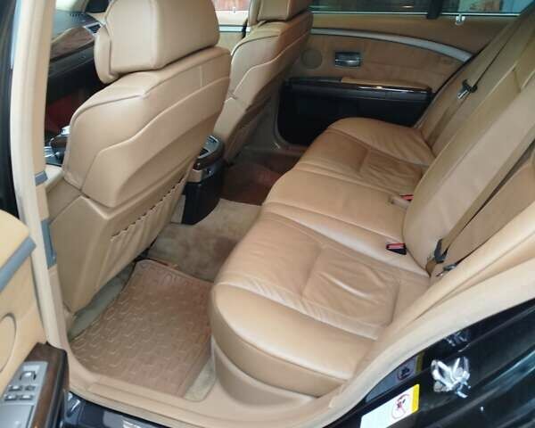 Черный БМВ 7 Серия, объемом двигателя 4.4 л и пробегом 407 тыс. км за 5600 $, фото 7 на Automoto.ua