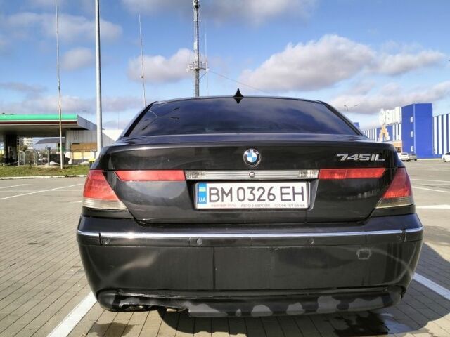 Черный БМВ 7 Серия, объемом двигателя 4.4 л и пробегом 240 тыс. км за 7000 $, фото 4 на Automoto.ua