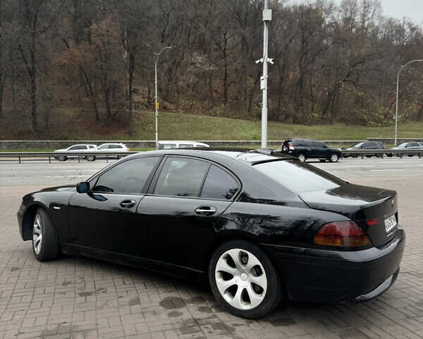 Черный БМВ 7 Серия, объемом двигателя 3 л и пробегом 305 тыс. км за 6650 $, фото 3 на Automoto.ua