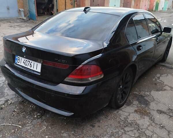 Черный БМВ 7 Серия, объемом двигателя 4.4 л и пробегом 407 тыс. км за 5600 $, фото 4 на Automoto.ua