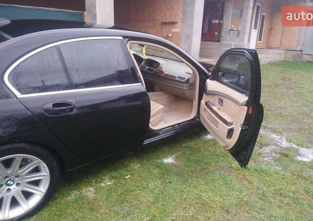 Черный БМВ 7 Серия, объемом двигателя 3 л и пробегом 299 тыс. км за 8000 $, фото 3 на Automoto.ua