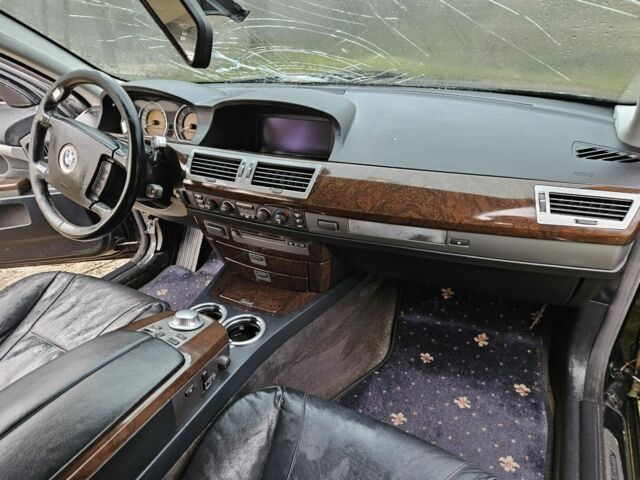 Черный БМВ 7 Серия, объемом двигателя 3 л и пробегом 300 тыс. км за 2700 $, фото 9 на Automoto.ua