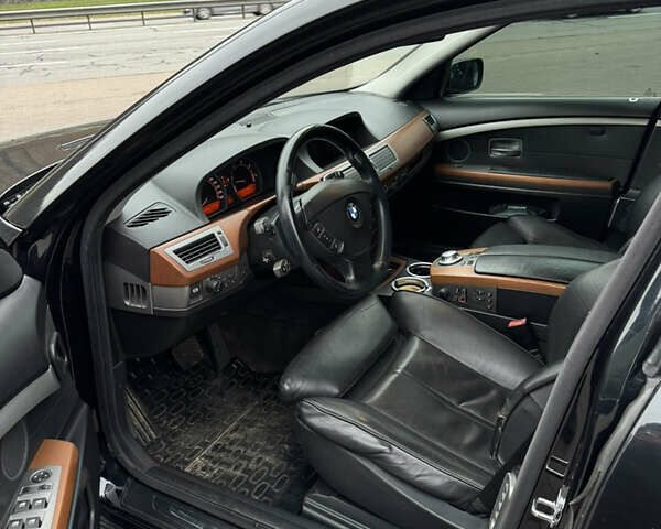 Черный БМВ 7 Серия, объемом двигателя 2.99 л и пробегом 306 тыс. км за 6700 $, фото 5 на Automoto.ua