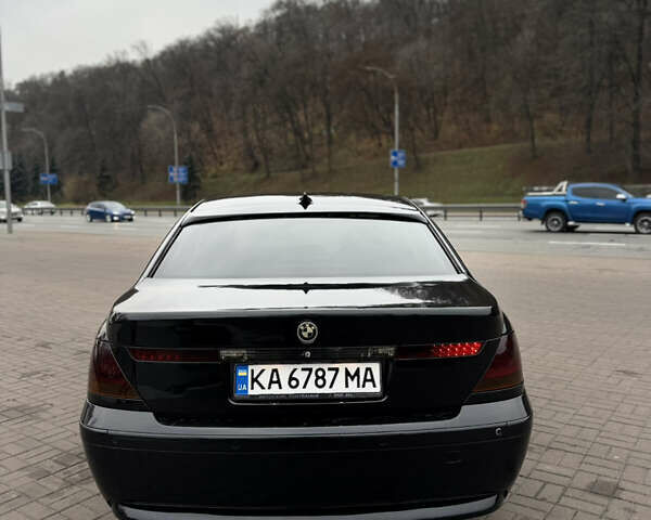 Черный БМВ 7 Серия, объемом двигателя 3 л и пробегом 305 тыс. км за 6650 $, фото 5 на Automoto.ua