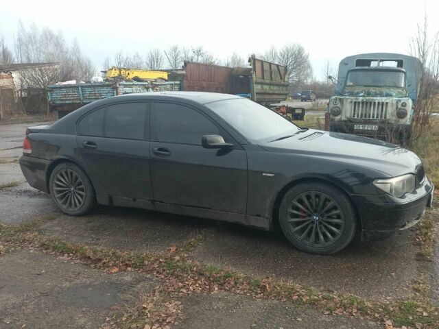 Черный БМВ 7 Серия, объемом двигателя 3 л и пробегом 420 тыс. км за 7000 $, фото 3 на Automoto.ua