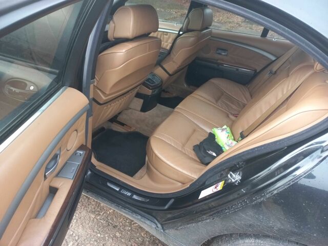 Черный БМВ 7 Серия, объемом двигателя 3 л и пробегом 420 тыс. км за 7000 $, фото 1 на Automoto.ua