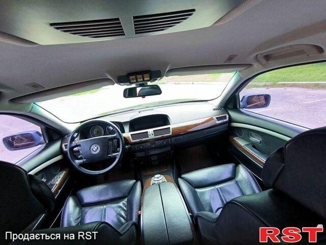 Чорний БМВ 7 Серія, об'ємом двигуна 4.4 л та пробігом 410 тис. км за 7700 $, фото 3 на Automoto.ua