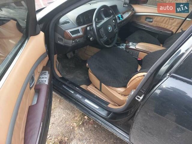 Черный БМВ 7 Серия, объемом двигателя 3 л и пробегом 420 тыс. км за 7000 $, фото 4 на Automoto.ua
