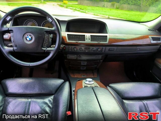 Чорний БМВ 7 Серія, об'ємом двигуна 4.4 л та пробігом 410 тис. км за 7700 $, фото 2 на Automoto.ua