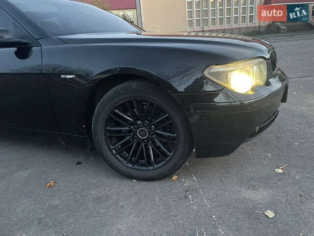Черный БМВ 7 Серия, объемом двигателя 4.4 л и пробегом 196 тыс. км за 7200 $, фото 10 на Automoto.ua