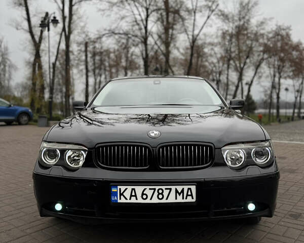 Черный БМВ 7 Серия, объемом двигателя 2.99 л и пробегом 306 тыс. км за 6700 $, фото 1 на Automoto.ua