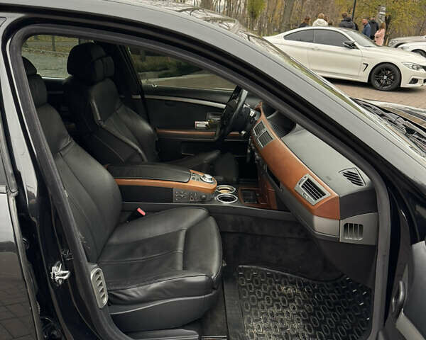 Черный БМВ 7 Серия, объемом двигателя 2.99 л и пробегом 306 тыс. км за 6700 $, фото 6 на Automoto.ua
