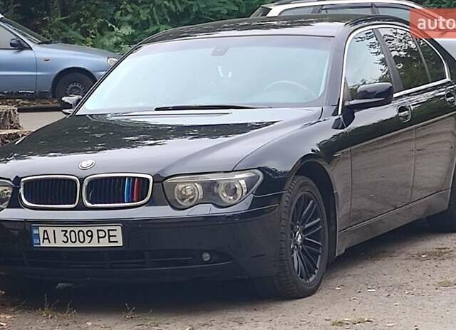 Чорний БМВ 7 Серія, об'ємом двигуна 3 л та пробігом 430 тис. км за 7300 $, фото 19 на Automoto.ua