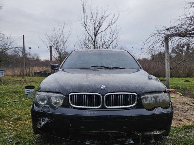 Черный БМВ 7 Серия, объемом двигателя 3 л и пробегом 300 тыс. км за 2700 $, фото 1 на Automoto.ua
