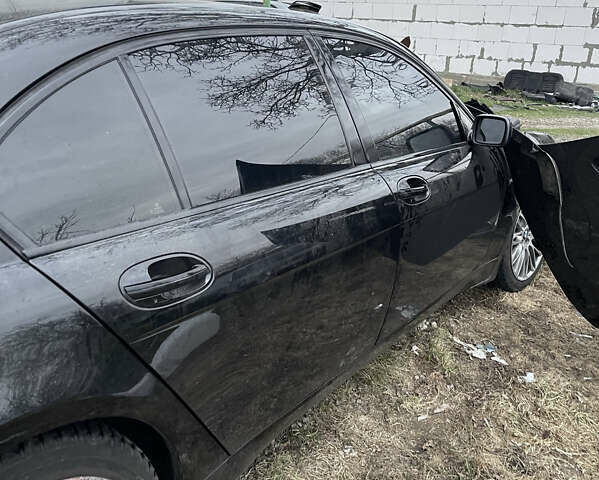 Черный БМВ 7 Серия, объемом двигателя 5.97 л и пробегом 300 тыс. км за 3400 $, фото 7 на Automoto.ua