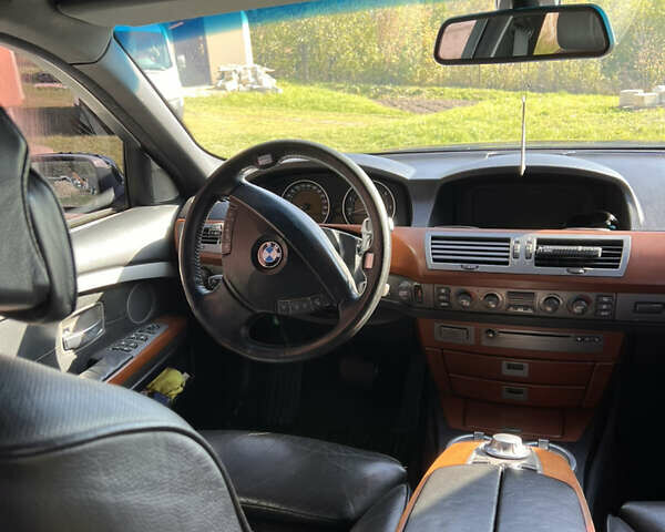 Чорний БМВ 7 Серія, об'ємом двигуна 2.99 л та пробігом 438 тис. км за 6600 $, фото 12 на Automoto.ua