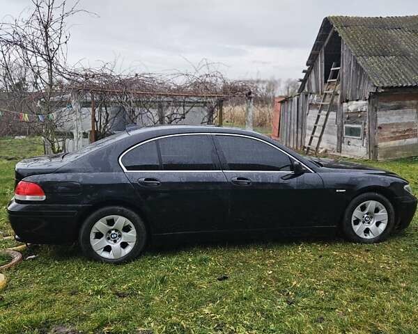 Черный БМВ 7 Серия, объемом двигателя 3.6 л и пробегом 300 тыс. км за 2700 $, фото 3 на Automoto.ua