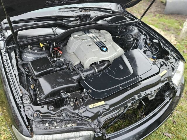 Черный БМВ 7 Серия, объемом двигателя 3 л и пробегом 300 тыс. км за 2700 $, фото 13 на Automoto.ua