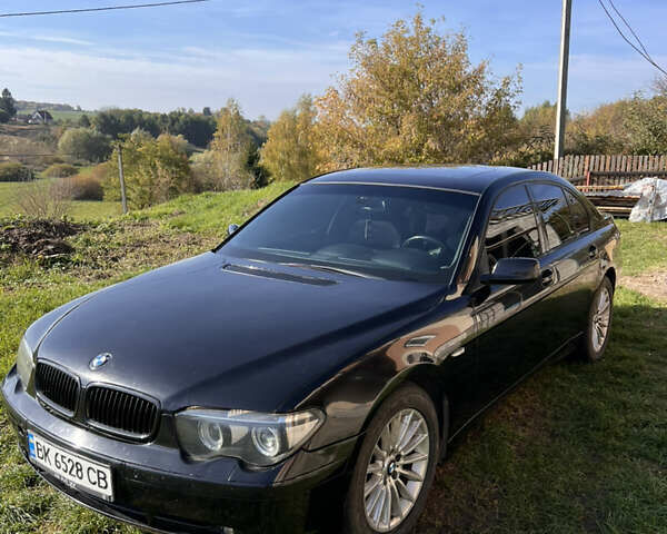 Чорний БМВ 7 Серія, об'ємом двигуна 2.99 л та пробігом 438 тис. км за 6600 $, фото 5 на Automoto.ua