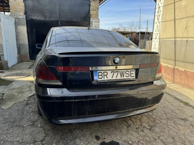 Черный БМВ 7 Серия, объемом двигателя 3 л и пробегом 400 тыс. км за 2500 $, фото 1 на Automoto.ua