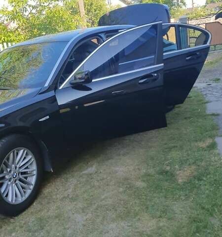 Черный БМВ 7 Серия, объемом двигателя 4.4 л и пробегом 250 тыс. км за 5500 $, фото 1 на Automoto.ua