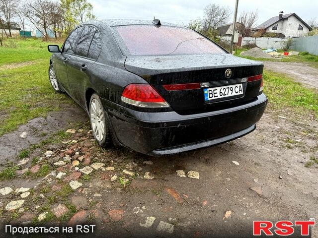 Чорний БМВ 7 Серія, об'ємом двигуна 3 л та пробігом 280 тис. км за 6500 $, фото 4 на Automoto.ua
