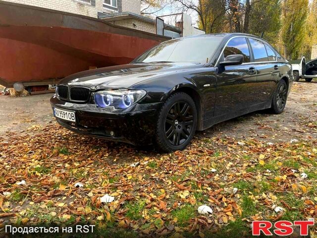 Чорний БМВ 7 Серія, об'ємом двигуна 3 л та пробігом 540 тис. км за 7000 $, фото 2 на Automoto.ua