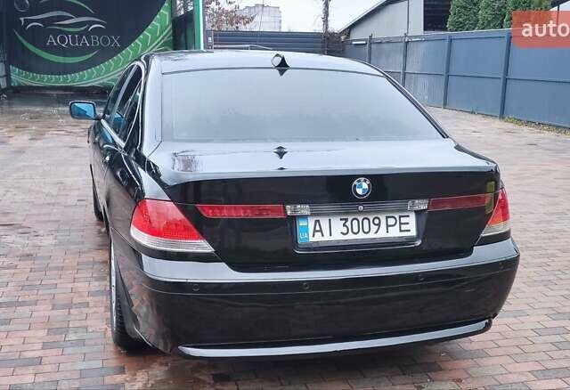 Чорний БМВ 7 Серія, об'ємом двигуна 3 л та пробігом 430 тис. км за 7300 $, фото 6 на Automoto.ua