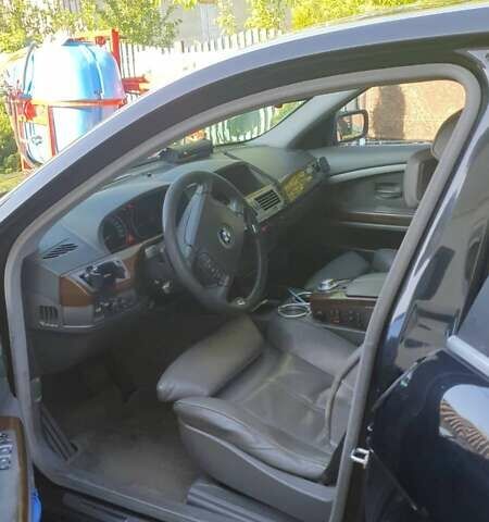 Черный БМВ 7 Серия, объемом двигателя 4.4 л и пробегом 250 тыс. км за 5500 $, фото 2 на Automoto.ua