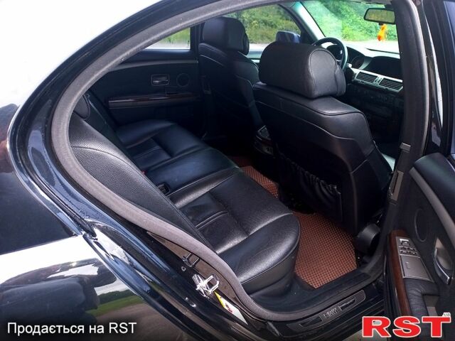 Черный БМВ 7 Серия, объемом двигателя 4.4 л и пробегом 320 тыс. км за 7000 $, фото 1 на Automoto.ua
