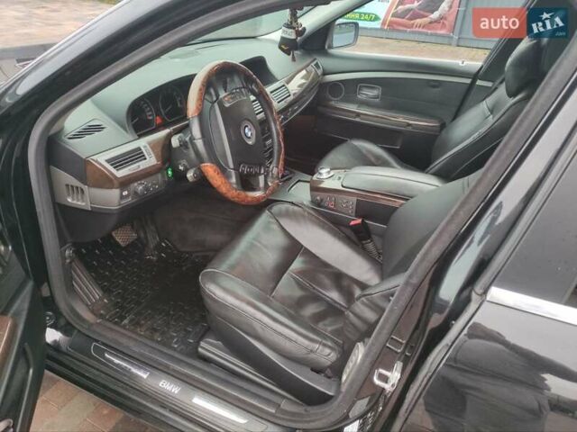 Чорний БМВ 7 Серія, об'ємом двигуна 3 л та пробігом 430 тис. км за 7300 $, фото 2 на Automoto.ua