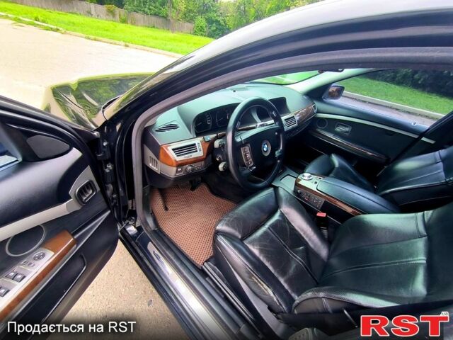 Чорний БМВ 7 Серія, об'ємом двигуна 4.4 л та пробігом 410 тис. км за 7700 $, фото 5 на Automoto.ua