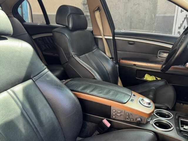 Черный БМВ 7 Серия, объемом двигателя 3 л и пробегом 400 тыс. км за 2500 $, фото 3 на Automoto.ua