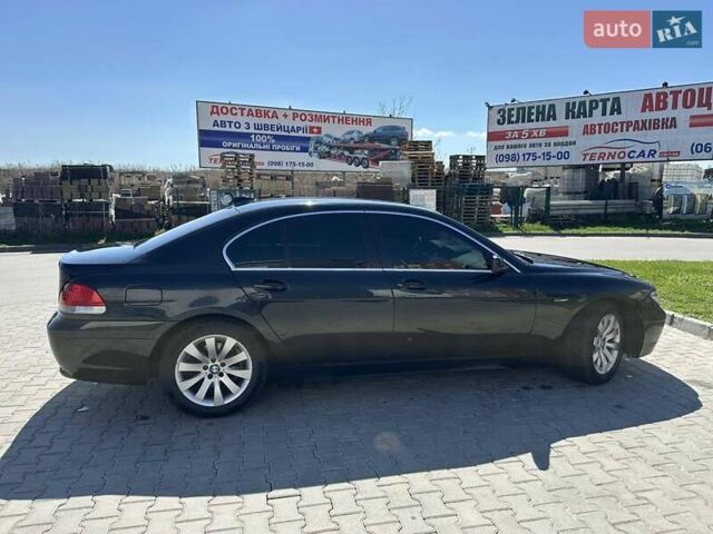 Черный БМВ 7 Серия, объемом двигателя 3 л и пробегом 410 тыс. км за 7200 $, фото 2 на Automoto.ua