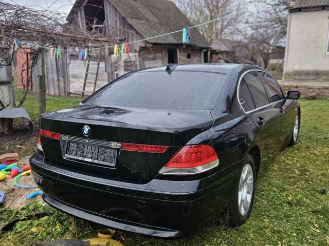 Черный БМВ 7 Серия, объемом двигателя 3 л и пробегом 300 тыс. км за 2700 $, фото 4 на Automoto.ua