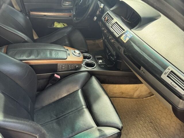 Черный БМВ 7 Серия, объемом двигателя 3 л и пробегом 400 тыс. км за 2500 $, фото 4 на Automoto.ua