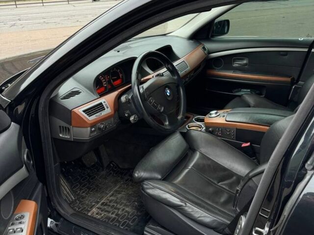 Черный БМВ 7 Серия, объемом двигателя 3 л и пробегом 305 тыс. км за 6700 $, фото 4 на Automoto.ua