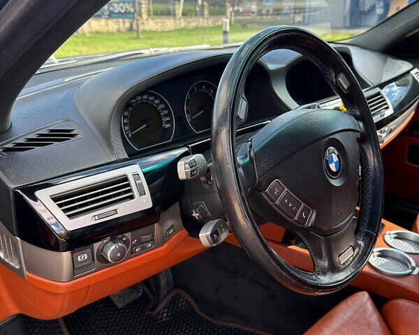 Черный БМВ 7 Серия, объемом двигателя 4 л и пробегом 403 тыс. км за 8500 $, фото 21 на Automoto.ua