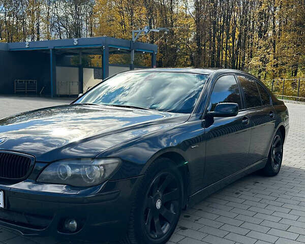Черный БМВ 7 Серия, объемом двигателя 4 л и пробегом 403 тыс. км за 8500 $, фото 5 на Automoto.ua