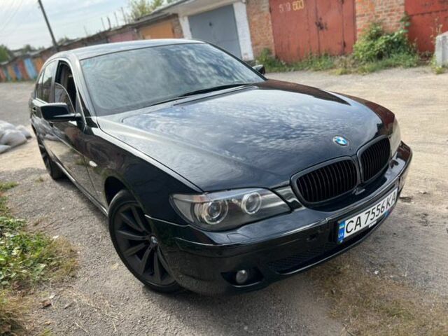 Черный БМВ 7 Серия, объемом двигателя 4 л и пробегом 577 тыс. км за 7200 $, фото 2 на Automoto.ua