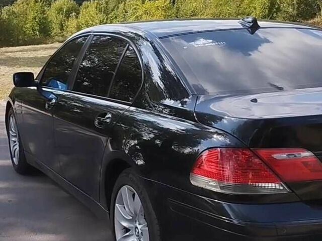 Черный БМВ 7 Серия, объемом двигателя 4 л и пробегом 268 тыс. км за 8500 $, фото 3 на Automoto.ua