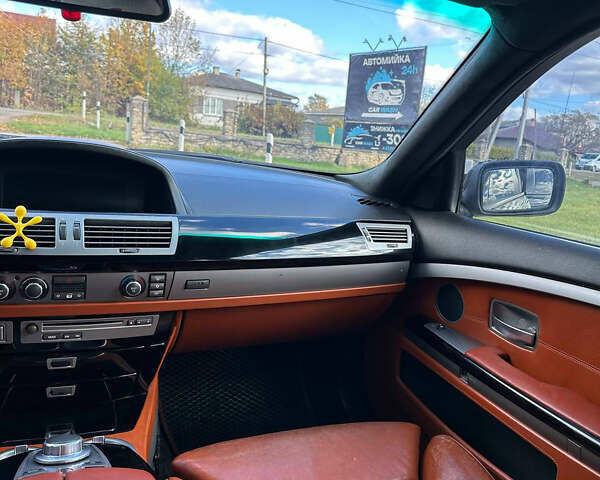 Черный БМВ 7 Серия, объемом двигателя 4 л и пробегом 403 тыс. км за 8500 $, фото 28 на Automoto.ua