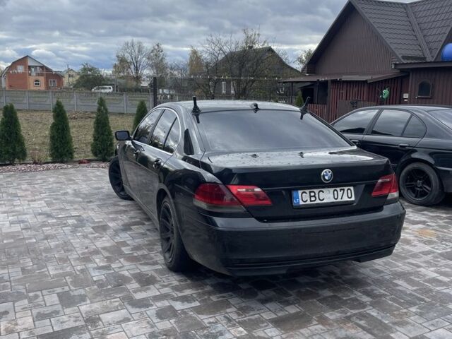 Черный БМВ 7 Серия, объемом двигателя 3 л и пробегом 250 тыс. км за 4200 $, фото 1 на Automoto.ua