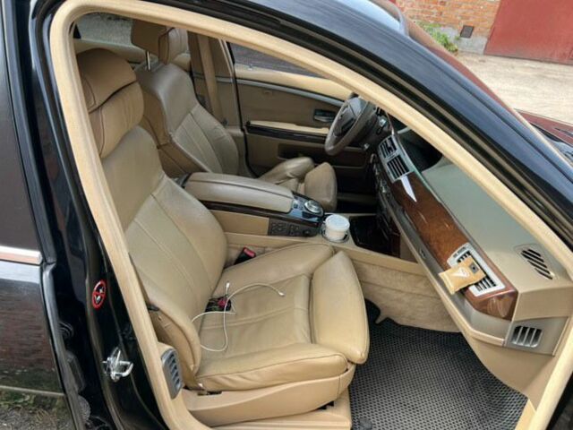 Черный БМВ 7 Серия, объемом двигателя 4 л и пробегом 577 тыс. км за 7200 $, фото 4 на Automoto.ua