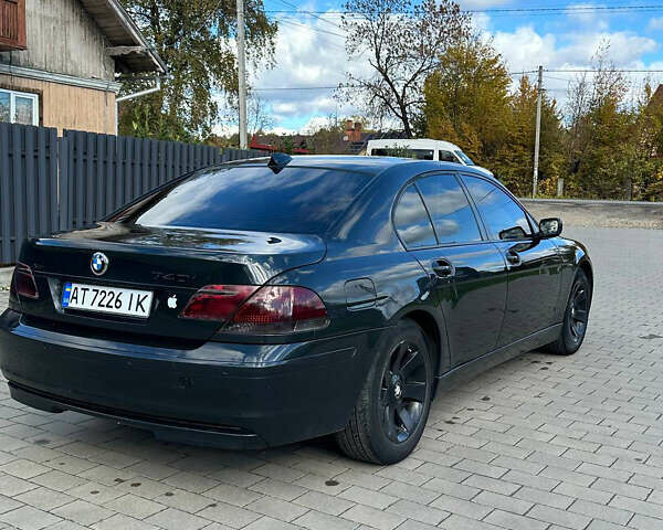 Черный БМВ 7 Серия, объемом двигателя 4 л и пробегом 403 тыс. км за 8500 $, фото 11 на Automoto.ua