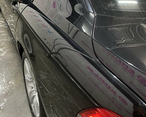 Чорний БМВ 7 Серія, об'ємом двигуна 3.98 л та пробігом 272 тис. км за 6750 $, фото 24 на Automoto.ua
