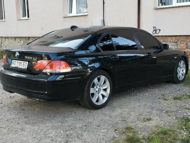 Чорний БМВ 7 Серія, об'ємом двигуна 4 л та пробігом 266 тис. км за 5499 $, фото 1 на Automoto.ua