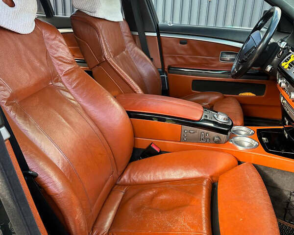 Черный БМВ 7 Серия, объемом двигателя 4 л и пробегом 403 тыс. км за 8500 $, фото 16 на Automoto.ua